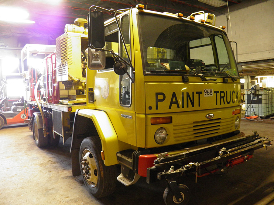 Delaware County paint truck in garage.