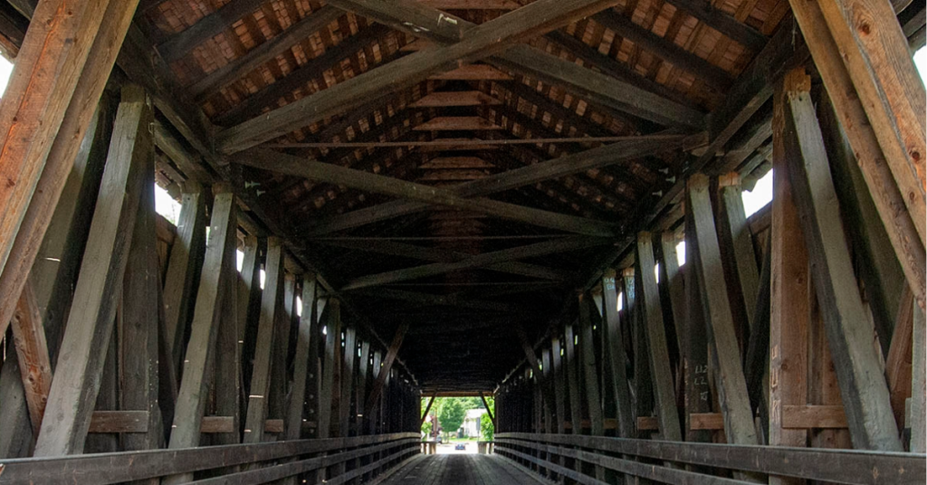 View looking through inside of covered bridge